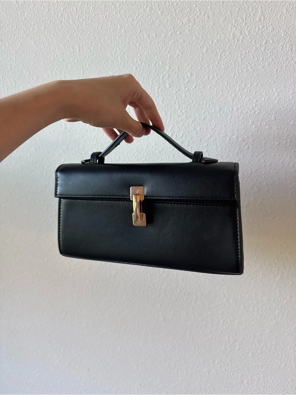 Amazon Black Top-Handle Satchel with Gold Clasp